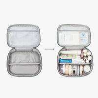 Portable cosmetic case with toiletries on a white background