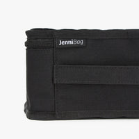 Black bag with a label on a white background
